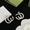 2023 Women's Classic Earrings stud Fashion Silver Earrings Vintage Hollow out Letter Personality Party Jewelry