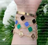 J￳ias cl￡ssicas de designers quatro folhas de trevo pulseira pulseira cadeia 18k Gold Agate Shell M￣e da Pearl para Womengirl M￣e do Dia do Dia do Dia das J￳ias Presentes