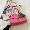 Väskor väska kvinnors väska enkel atmosfär 2022 Ny liten fyrkantig krokodilstruktur en axel bärbara plånböcker