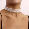 Ras du cou Style français blanc Imitation perle multicouche collier tempérament rétro élégant perles faites à la main chaîne courte dames bijoux