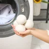 Boules de séchage en laine réutilisables Produits de lessive de qualité supérieure Assouplissant de tissu naturel Réduit l'électricité statique Aide à sécher le linge plus rapidement DH98