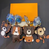 2021 Designer Lion Tiger Monkey Bear Keychain Laser Embossed Bag Pendants With Box Keychains PU Leather Animal Car Keyrings 1853239R