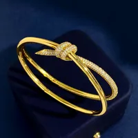 Nieuw ontworpen bangle armband knoop touw volle diamanten hanger charme dames luxueuze geknoopte kruis diamant knoop dames ketting armbanden ontwerper sieraden cadeau