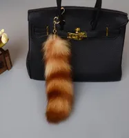 Lunghezza 25 cm Real Raccoon Furpe Stripe Tailchain Charms Women Borse Borsa Penderant Pompom Key Rings Styling Chiave Chiave Chians4863412