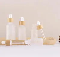Frosted Clear Face Cream Lotion ELIQUID Glass Dropper Bottles Refillable Cosmetic Container 5100ml Wooden Lids9310984