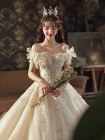 Presiding wedding dress new style temperament super Xiansen dreamy wedding dress simple one-line shoulder thin tail Hepburn bride wedding dress