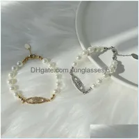 Pulsera de cuentas Pearl Strand Diamond Tennis Planet Bracelets Mujer Diseñador de oro Accesorios de moda Girls Glam Gfi Dhoh7