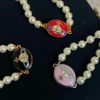 Hänghalsband kvinnor emaljmagnet spänne pärlhalsband klavikelkedja planet designer smycken droppleverans hänge dhatc