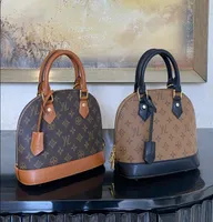 2023 Alma BB Fashion Women Counter Counter Facs Retro Luxurys Designers Bag Leather Handbags Shell Wallet Presy Ladies Cosmetic Crossbody Bags Tote