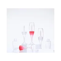 Botellas de embalaje Copa forma de contenedor de brillo de labios vacío 8 ml Botella de labio maquillaje cosmético tubo de lápices de labios plástico de rosa transparente Dhqgs Dhqgs