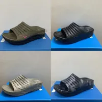 Hoka One Men Ora Recuperación de tobogán de recuperación Sandalias de zapatillas para hombres calmantes del ejército negro Sandalias de zapatillas 2022 Color nuevo Color Oxford Slipper