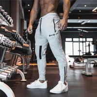 Calças masculinas Yemeke 2023 estas masculas Man Gyms Fitness Bodybuilding Joggers Workout Troushers Men Casual Cotton Lápis
