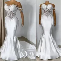 2023 Plus Size Mermaid Wedding Dresses Bridal Gown Pearls Beaded Long Sleeves Lace Applique Crystals Ruffles Custom Made Vestidos de novia