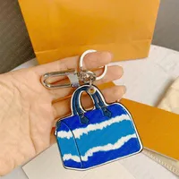 M69292 Signature ESCALE SPEED KEY HOLDER BAG CHARM Keychain Car Key Ring Chain Bell Name ID Bag Tag Stamping Stamp Pouch Cles 312x