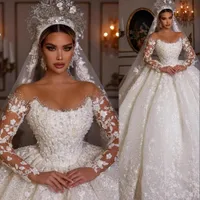 2023 Ball Gown Wedding Dresses Luxury Sequined Lace Crystal Beading Jewel Neck Illusion Long Sleeves Dubai Arabic Sequins Bride Bridal Gowns Vestido De Noiva