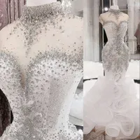 2023 Luxurious Mermaid Wedding Dresses Arabic Silver Crystals Beaded High Neck Illusion Ruffles Tiered Bridal Dresses Cap Sleeves Bridal Gowns Hollow Back
