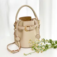 2023 Early Spring New fashion travelWomen's Bag Handheld Bun Mother Leather Bucket Design Feeling Advanced Pleated Single Shoulder Crossbody