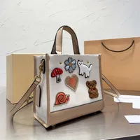 bags totes handbag designer bag comen classic imitation brand leather cartoon letter shoulder beach bag versatile chain commuter party wallet
