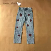 El diseñador de jeans hace pantalones rectos de cromo viejos estampados de letras del corazón para mujeres hombres casuales de estilo largo9 9 7knj