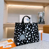 23 Women Luxurys Designers MM Upscale Totes Bags onthego Handbag Shouder Crossbody Bag Wave Point Genuine Leather Messenger Ladies Handbags Pouch Purse 34cm