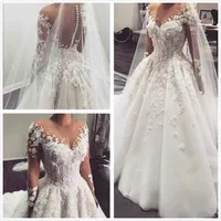 Elegant Lace A Line Wedding Dresses Arabic Sheer Long Sleeves Tulle Lace Applique Sweep Train Bridal Wedding Gowns With Buttons BC3370