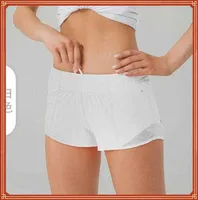 23ESS SUMMER YOGA HOTTY HOTA SHORTS BEACHABLE Snabbtorkning Sport Underkläder Kvinnor Pocket Running Fitness Pants Princess Lulus Design Trend