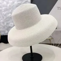 2023 Audrey Hepburn Straw Hat Sunken Modellering Tool Bell-vormige Big rand hoed Vintage High Pretend Bility Tourist Beach Sfeer CX200714