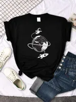Les t-shirts pour femmes voyagent dans des chemises spatiales mode basique top top t-shirt surdimensionné Harajuku