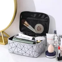 Nueva bolsa de maquillaje láser de geometría de timbre con bags de lavado de maquillaje de maquillaje súper insign