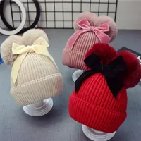 9styles Double Fur Ball Bow Hats Baby Pom Beanie Gaanie Capilla Niños Niños Baby Girl Winter Winter Crochet Cabellado Accesorios de sombrero Caps234b
