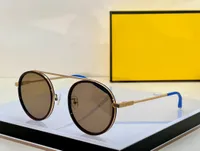 M0025/S 둥근 선글라스 여성 남성 남성 골드 브라운 렌즈 태양 음영 패션 안경 가파스 드 솔 디자이너 선글라스 UV400 안경 상자
