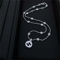 2023 Designer New Fashion jewelry Gujia 925 silver double round bead snowflake body letter interlocking pendant Plum Blossom Necklace women's clavicle chain
