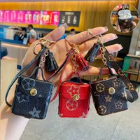 Fashion Designer Airpods Case Keychains Trinkets PU Leather Key Rings Chains Jewelry Brown Flower Pendant Bag Charms Keyrings Car Keys