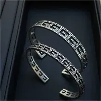 2023 Designer New Fashion jewelry S925 antique interlocking carved hollowed out old square wide narrow version couple bracelet for men and women