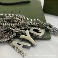 2023 Designer New Fashion jewelry Gujia double letter Necklace 26 English old carved couple sweater chains