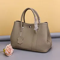 Designer Garden Bag Women's Party Genuine Leather Women's Top Layer Cow Leather Carrying Small Crowd High-grade Women's zc