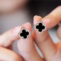 Designer silver needle clover stud earrings simple temperament micro-set zircon clever earrings women