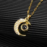 Naszyjniki wisiorek kryształ księżyc urok 100 języków kocham cię naszyjnik projekcyjny dla kobiet piesących biżuterię Prezenty mama collier femme