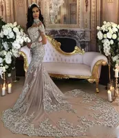 Dubai Arabic Luxury Sparkly 2021 Wedding Dresses Sexy Bling Beaded Lace Applique High Neck Illusion Long Sleeves Mermaid Chapel Br1162850