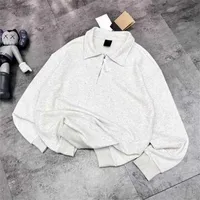 Cheap Clothing Wholesales 50% off Early Spring 2023 New Men's and Women's Loose Half Zip Polo Top Small Embroidery Couple Sweater