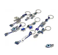 Chaços de chaves da borboleta de borboleta elefante de elefante Evil Eyes Keychain Chain Chain Glass Blue Eye Pinging Ornament Rin Drop Delivery9006213
