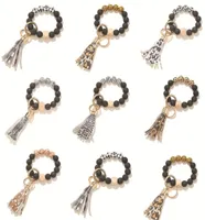 Fashion Black Frosted Wooden Bead Bracelet Keychain key chain Pattern Tassel Pendant Bracelets Women Girl Key ring keyring Wrist S1456571