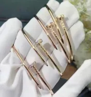 Ladies Luxury Glamour gold charm bracelet Classic Nail bangle Unisex Valentine Day Wedding Gift 18K Gold Jewelry Stainless Steel4463602