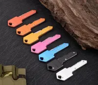 7 Colors Mini Folding Knife Keychain Outdoor Gadgets Key Shape Pocket Fruit Knifes Multifunctional Tool Key chain Saber Swiss Self8395758