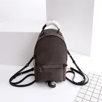 Genuine Leather women Backpacks High Quality Fashion Mini size School Bags men and Children Backpack brand designer Springs Lady T239g