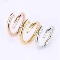 Titanium steel single nail ring European and American fashion street hip-hop casual couple classic golden silver rose optional siz262a
