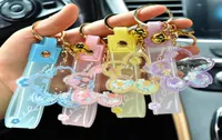 Creative Oil Sakura Flower KeyChain Women Liquid Sequin Keyring Charm Bag Car Pendant Key Chain for Kids Gift8110831