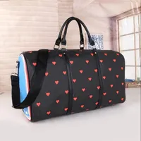 50cm women men bags fashion duffle bag leather luggage handbags large heart pattern capacity sport294O
