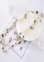 Ladies long pearl necklace pendant wild doublesided drip glaze camellia decorative chain pendant GD11496727680