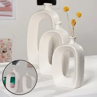 Vases White Ceramic Flower Hollow Oval Matte Design Modern Geometric Figurines Ornament For Living Room HK3